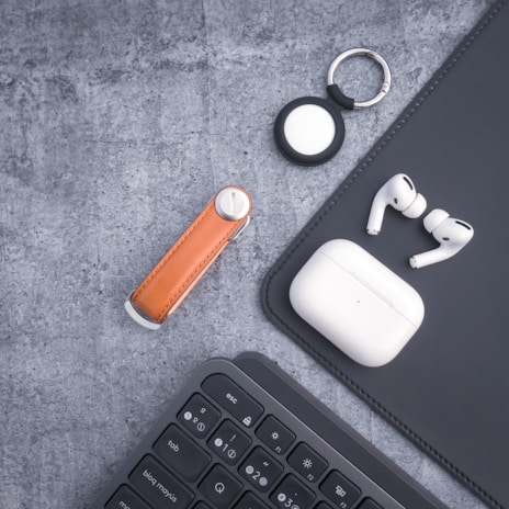 A creative flat lay of gmd earbuds with accessories.