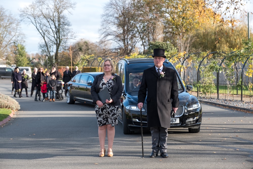 a couple of people that are standing in the street