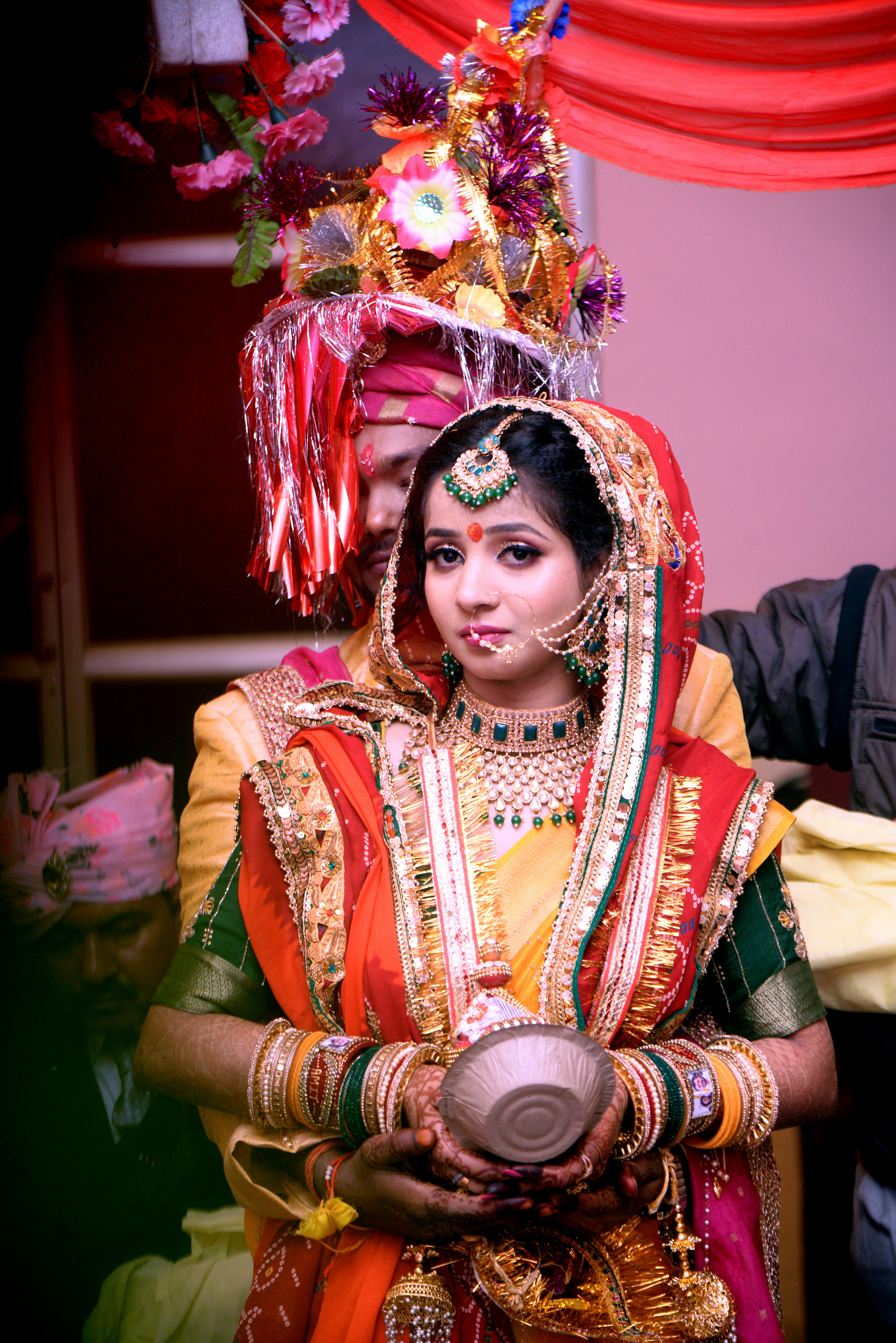 South Indian couple in colorful traditional wedding attire