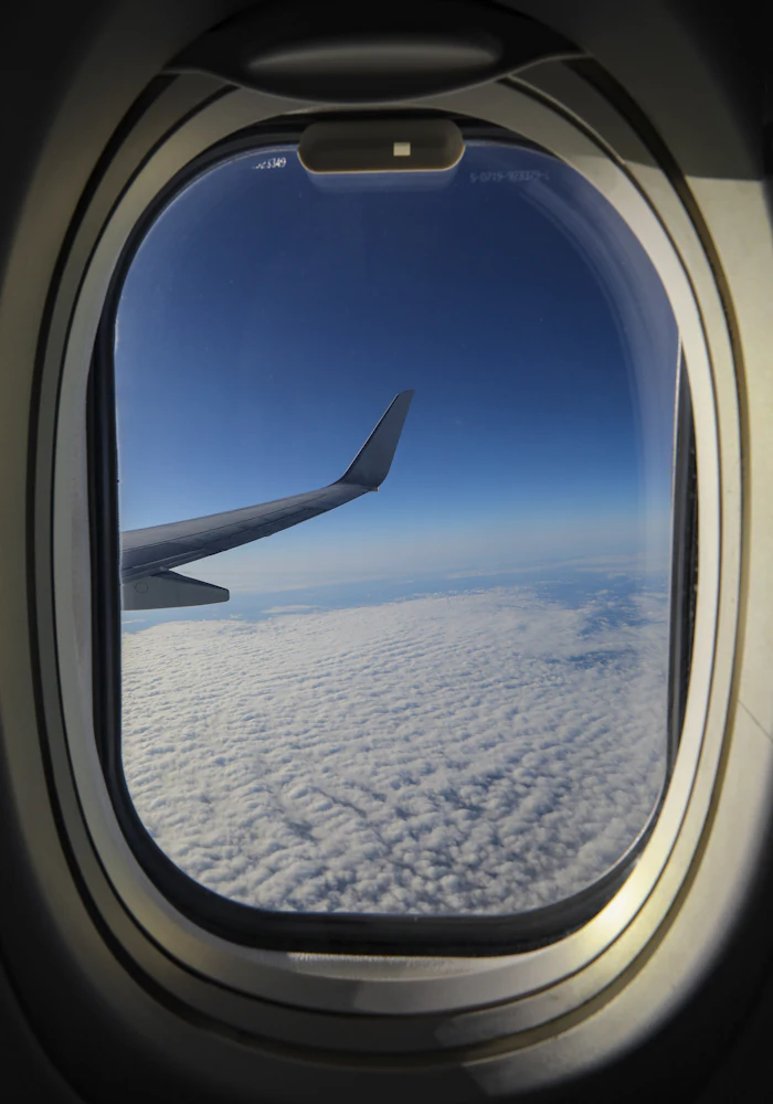 Clouds seen through a plane window