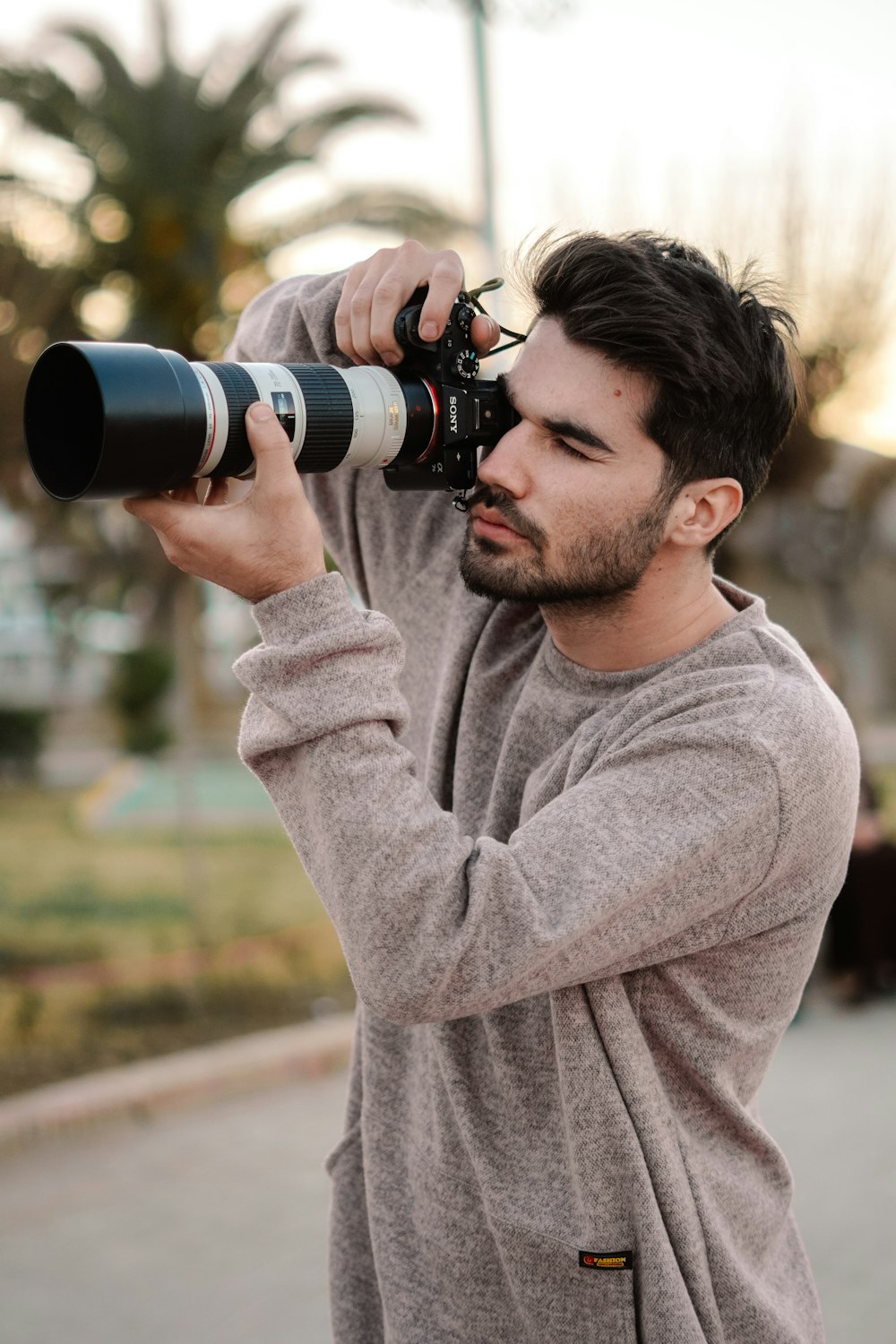 a man taking a picture with a camera