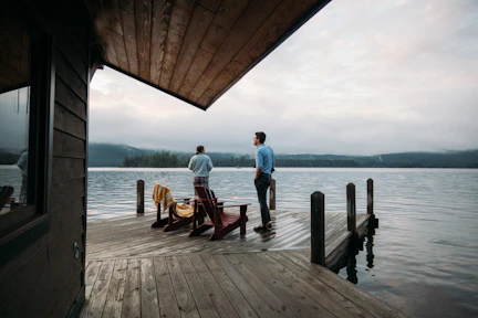 Couple considering cottage financing options for buying their dream waterfront property.