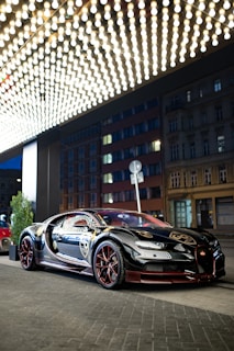 Elevé Group a bugatti car parked in front of a building