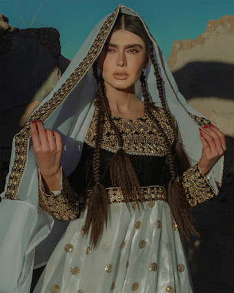 a woman in a white and black dress