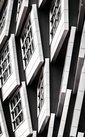 Close-up of sleek aluminum window frames with a matte black finish in a modern Lima apartment.
