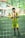 a young boy standing in front of a soccer net