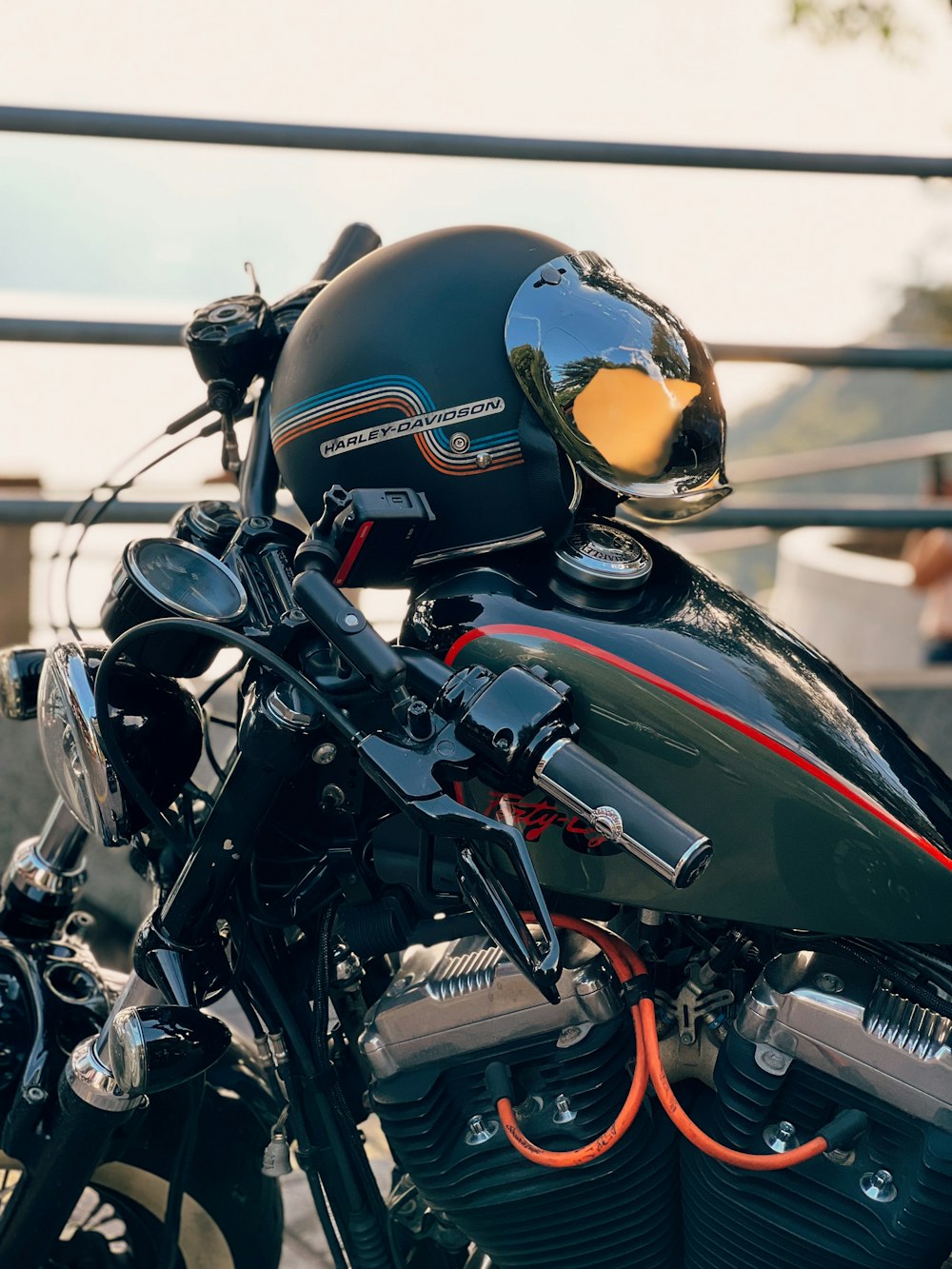 a close up of a motorcycle with a helmet on