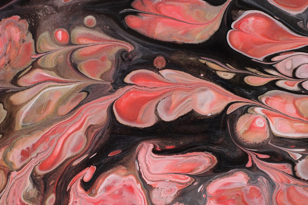 an abstract painting of pink and black colors