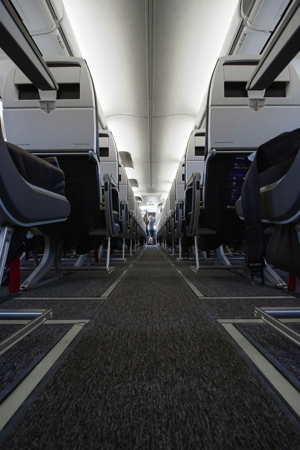 a row of empty seats on an airplane