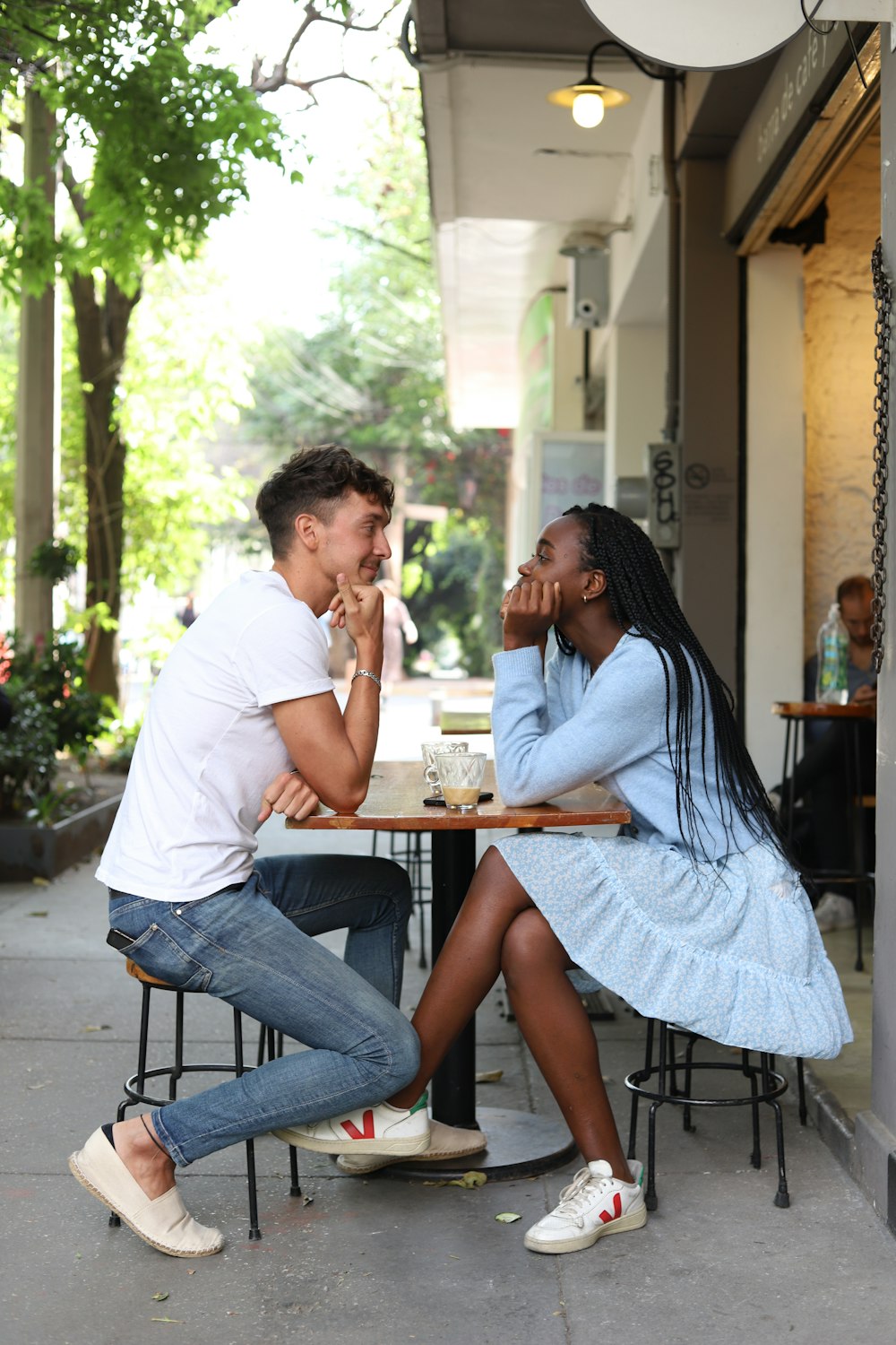 a man and a woman sitting at a table