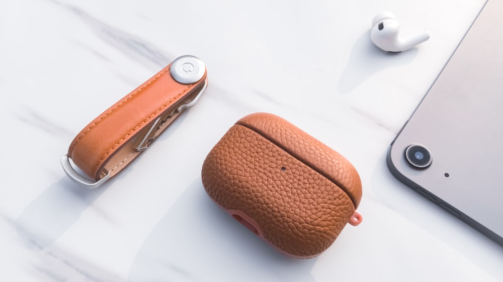 a pair of ear buds sitting on top of a table