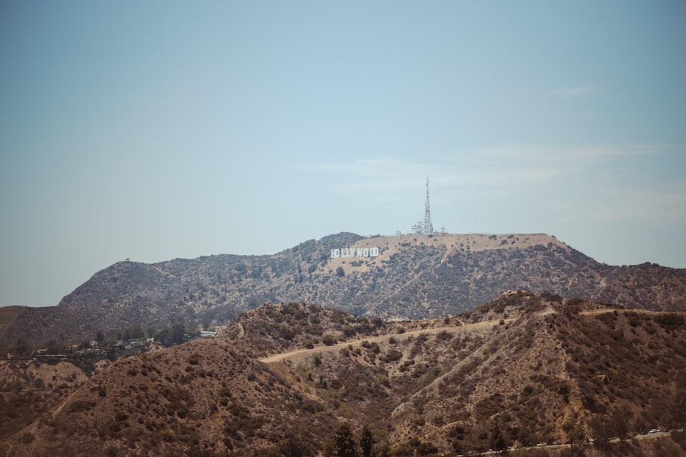 a hill with a radio tower on top of it