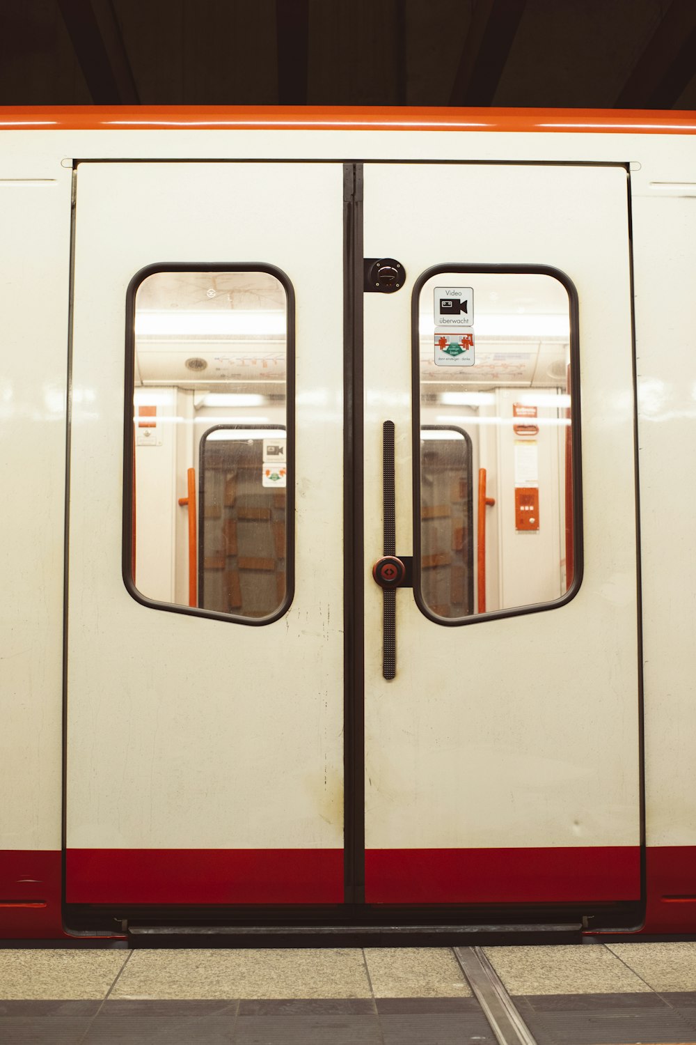 the doors of a train are open on the platform