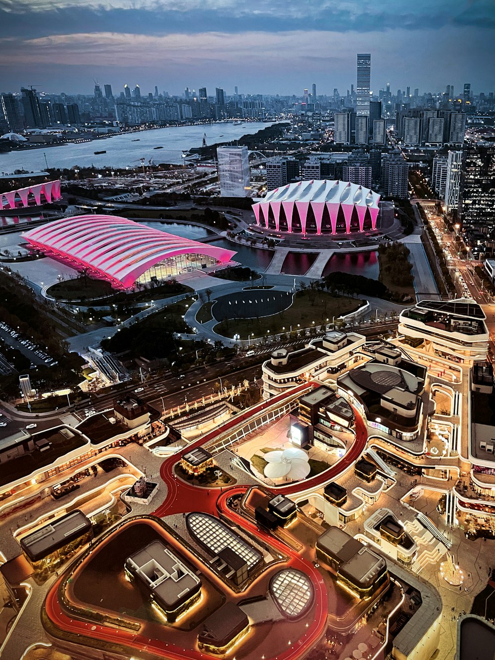 an aerial view of a city at night