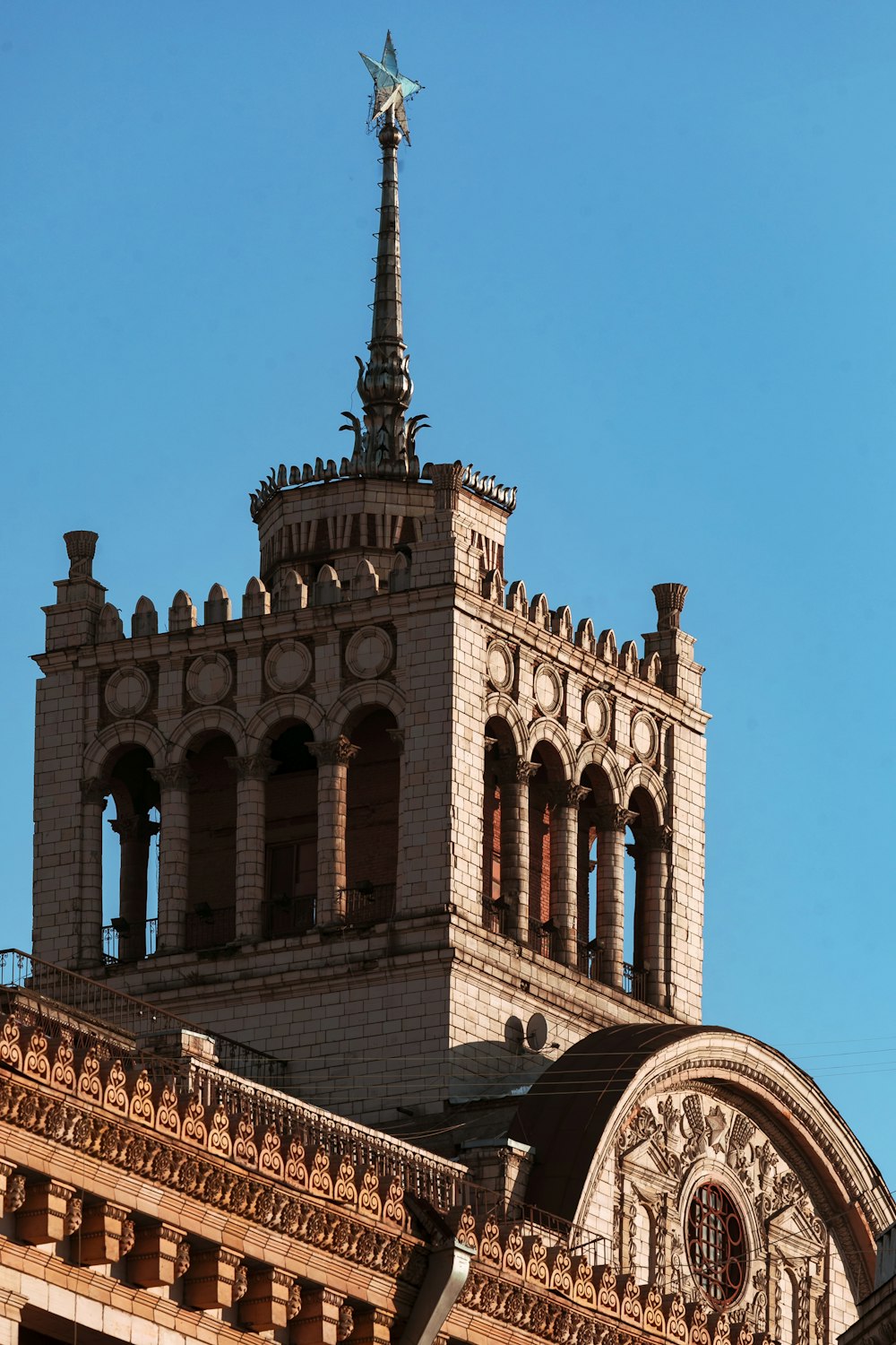 a tall building with a clock on the top of it