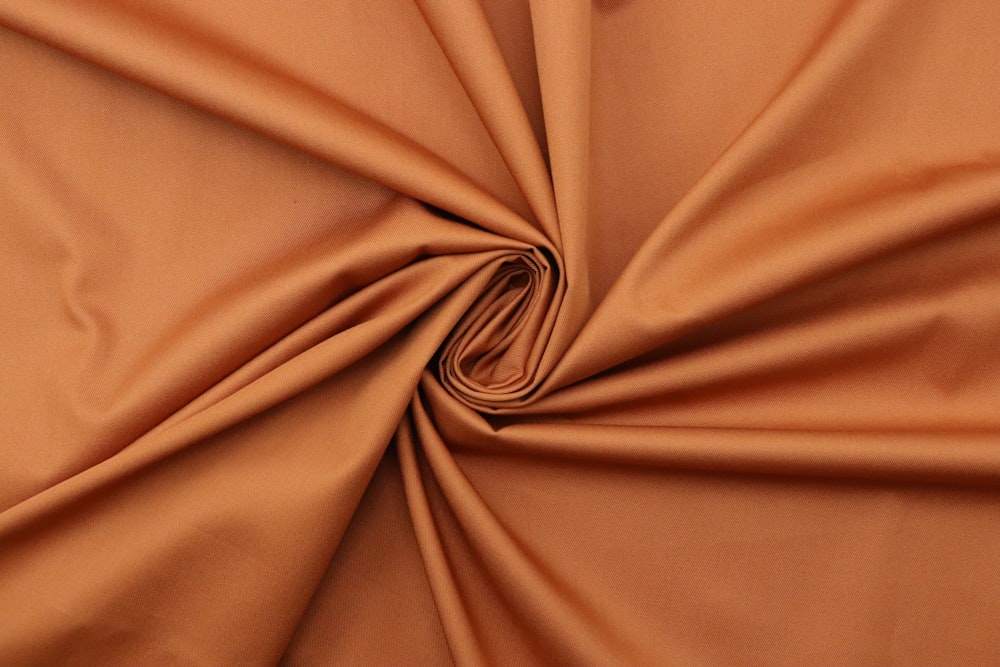 a close up view of a tan fabric