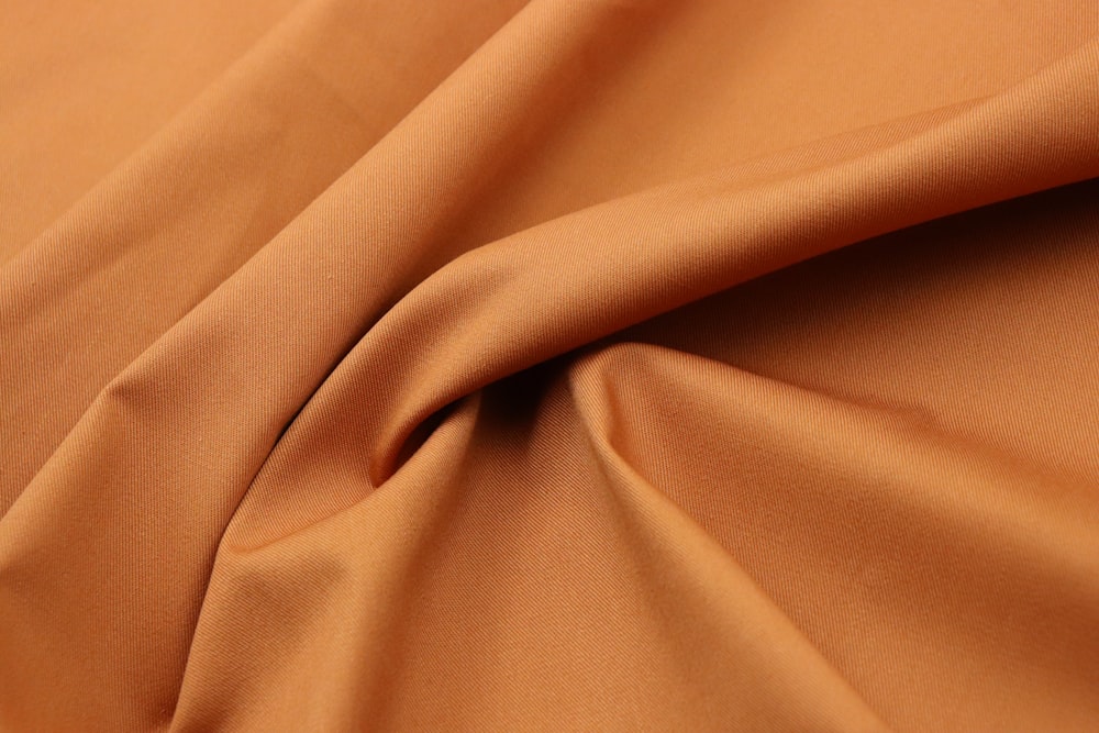 a close up view of a tan fabric