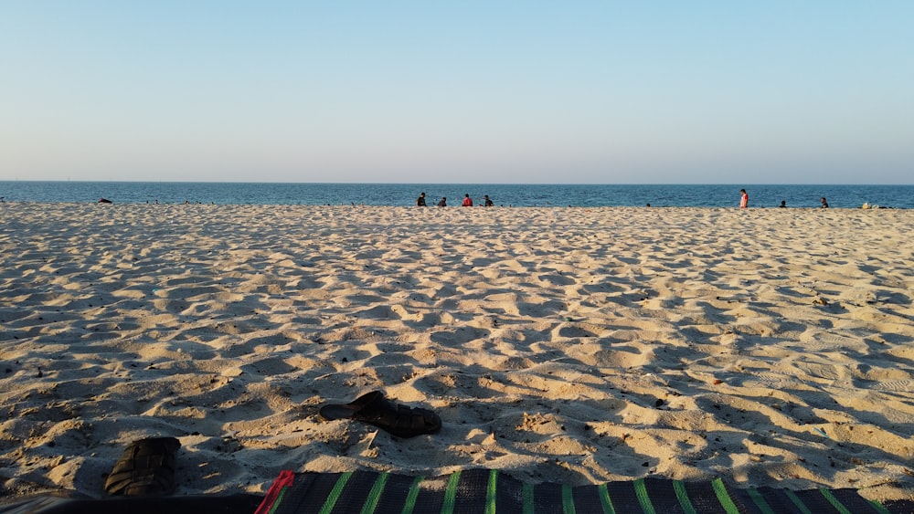 a view of a beach with people on it