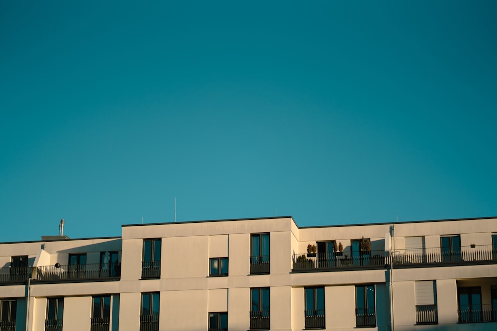 an apartment building with balconies and balconies on the balconies