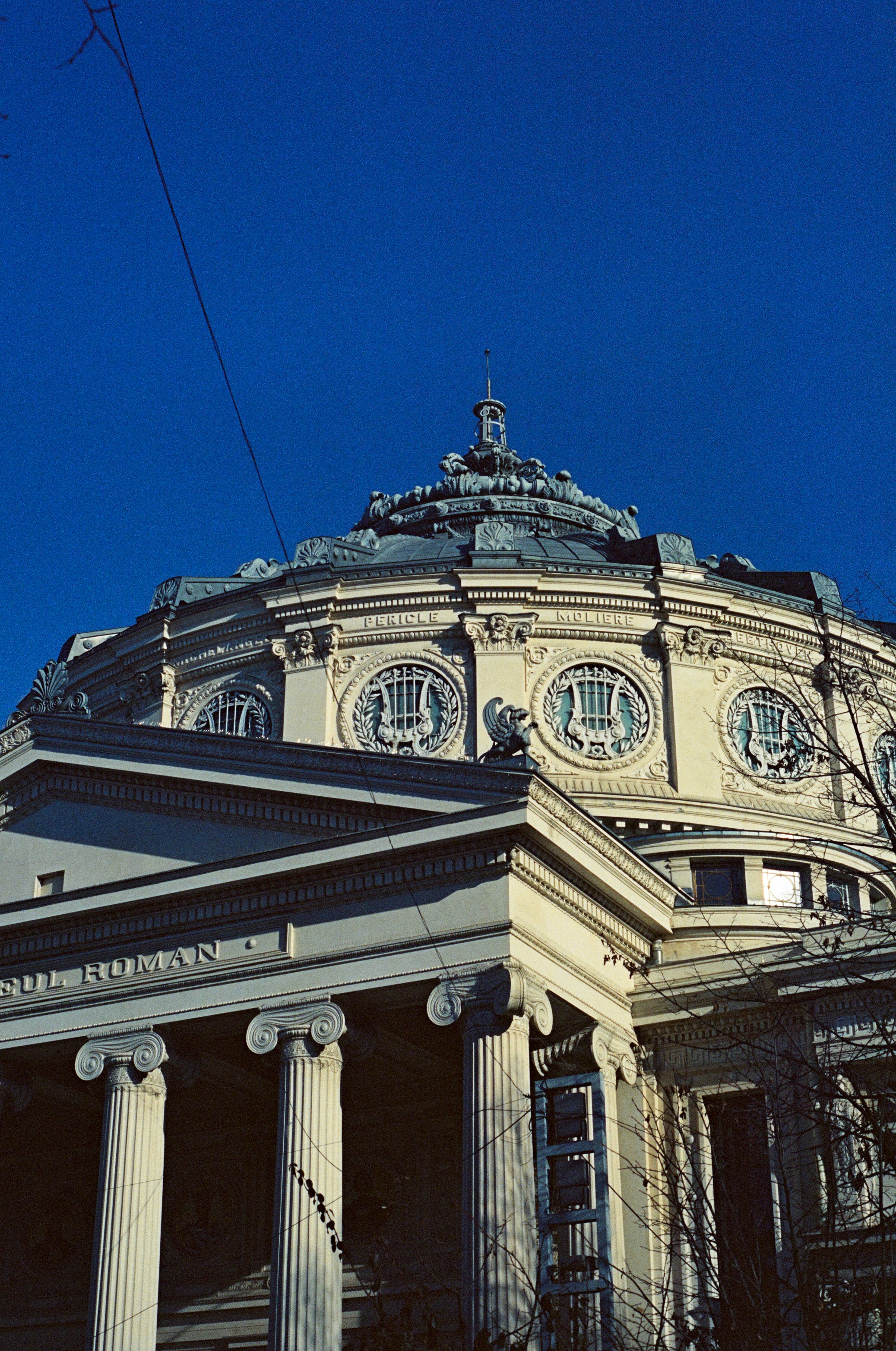 a large building with a clock on the top of it