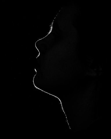 a black and white photo of a woman's face