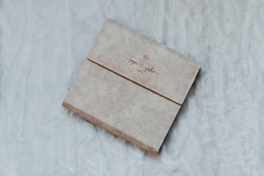A beautifully crafted personalized album with elegant fabric cover.
