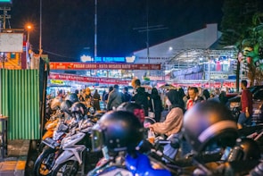 The bustling streets of Saigon alive with colorful motorbikes and vibrant market stalls.