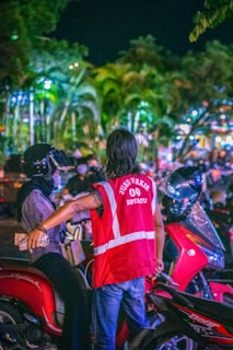 Controller interacting with a client beside a vehicle, showing professionalism and care