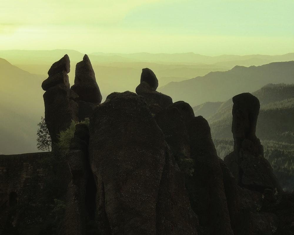 a group of rocks sitting on top of a mountain