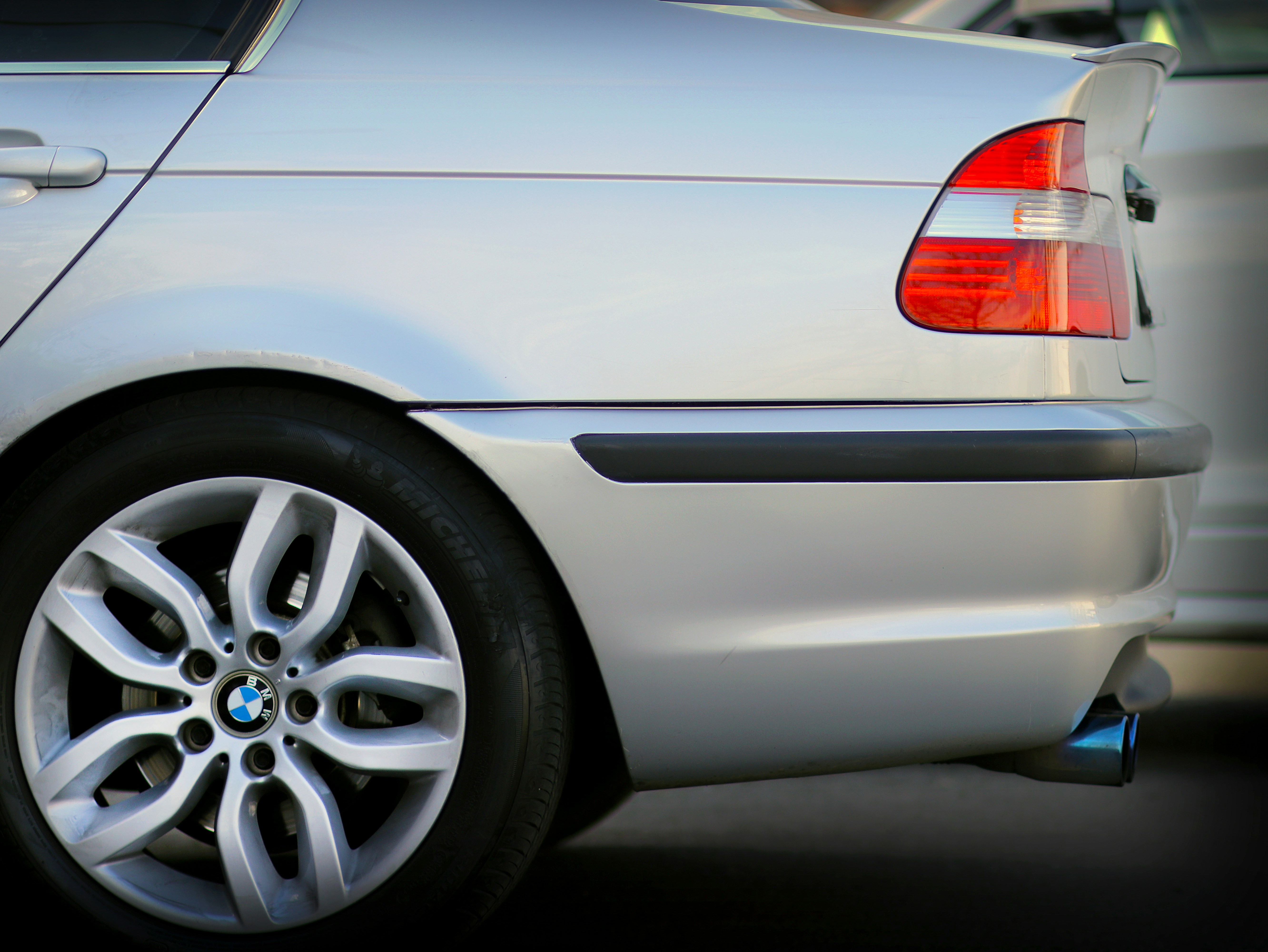 a white car parked next to a white car