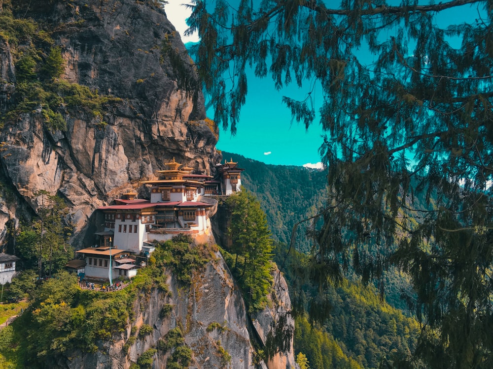 a mountain with a very tall building on top of it