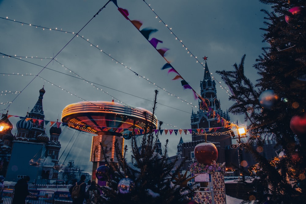 a carousel in the middle of a christmas tree