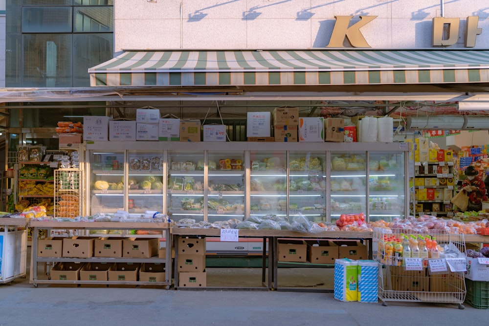 a grocery store with boxes of food on display