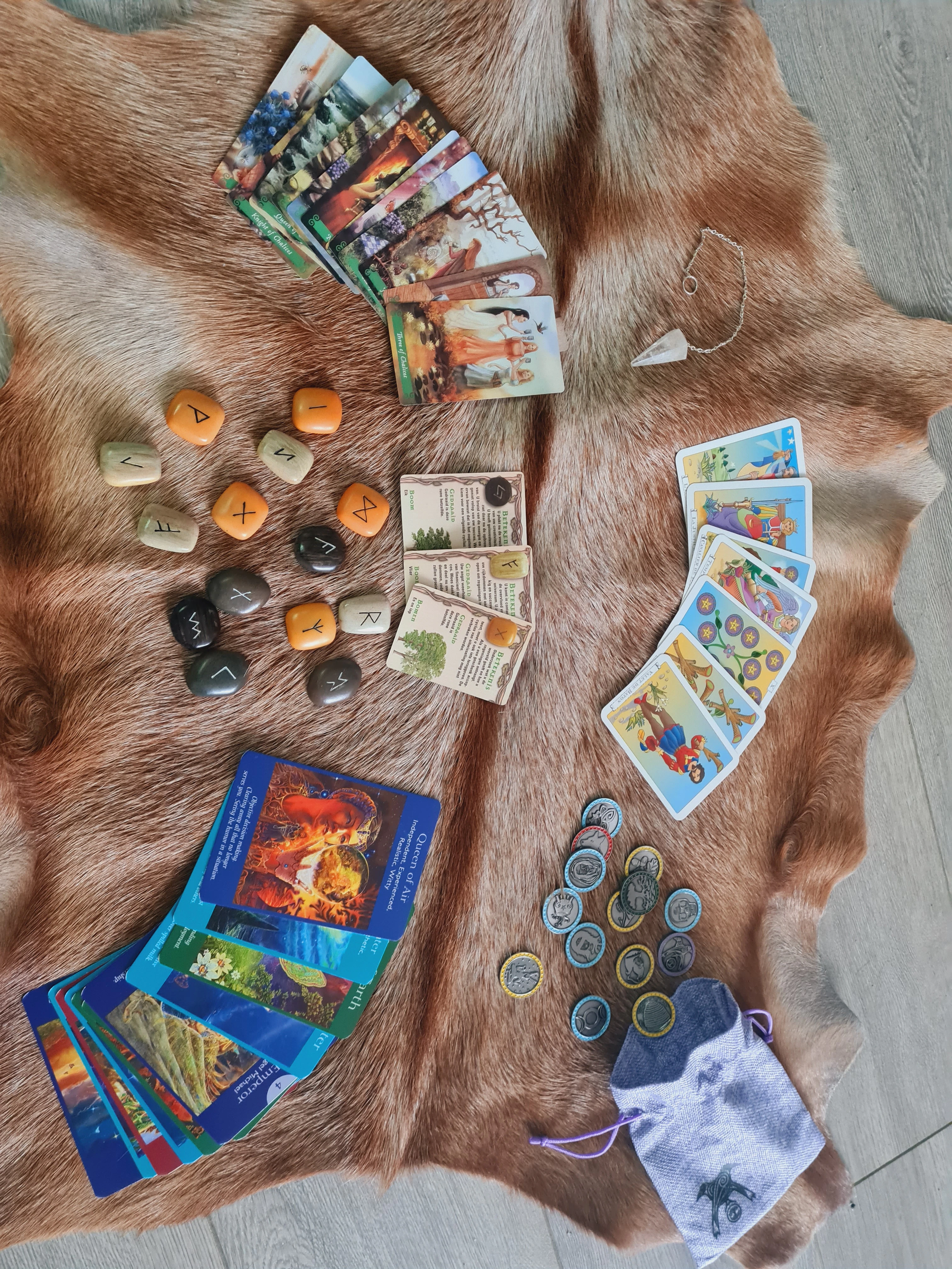 Tarot cards laid out on a mystical table for a spiritual reading session