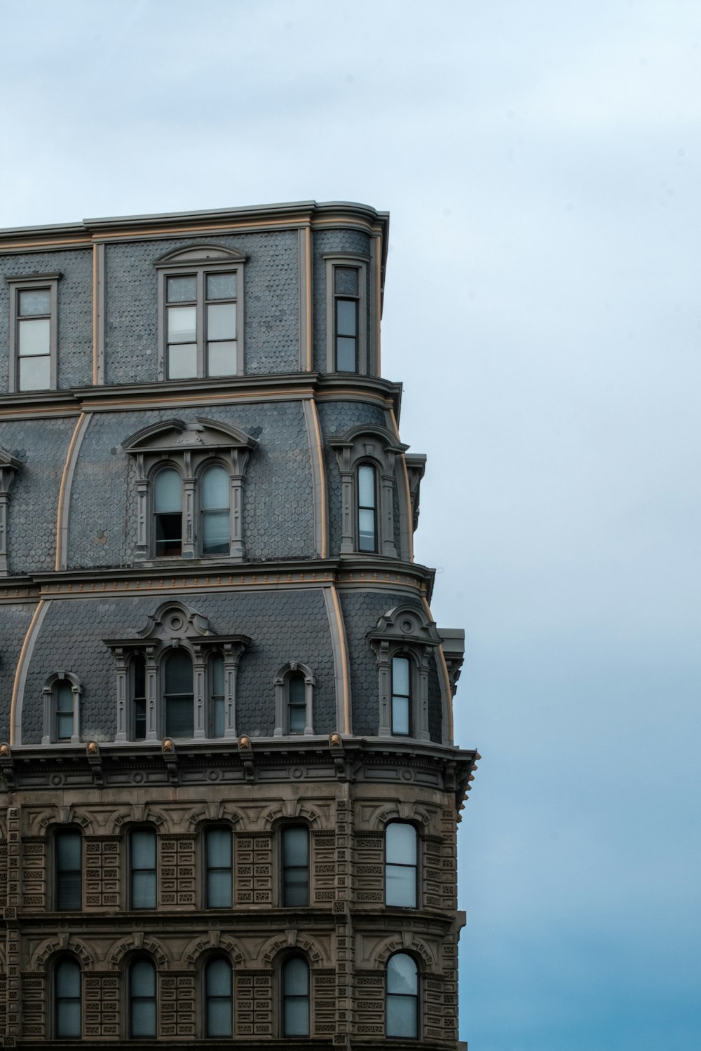 a very tall building with a clock on the top of it