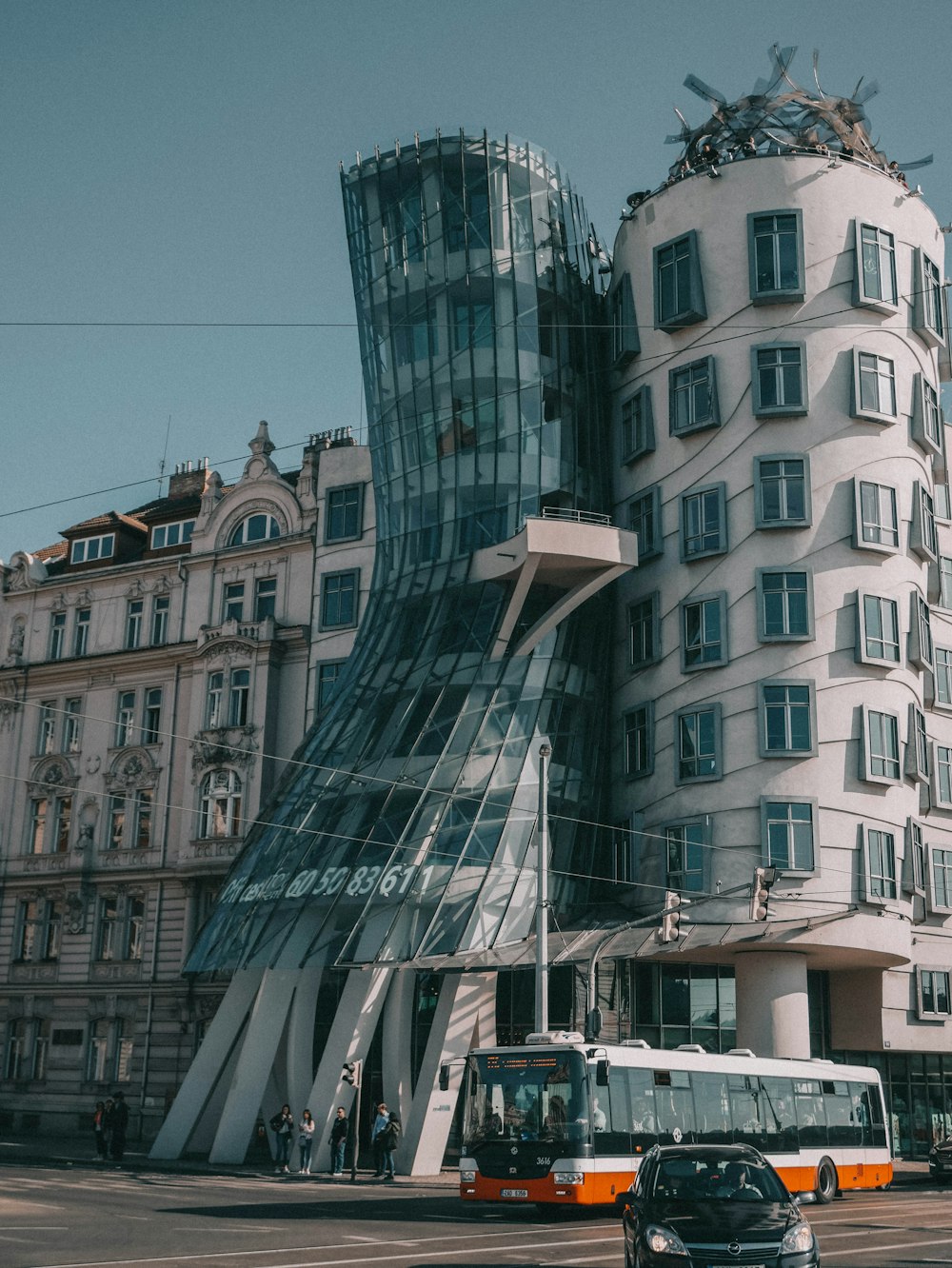 a bus is parked in front of a building