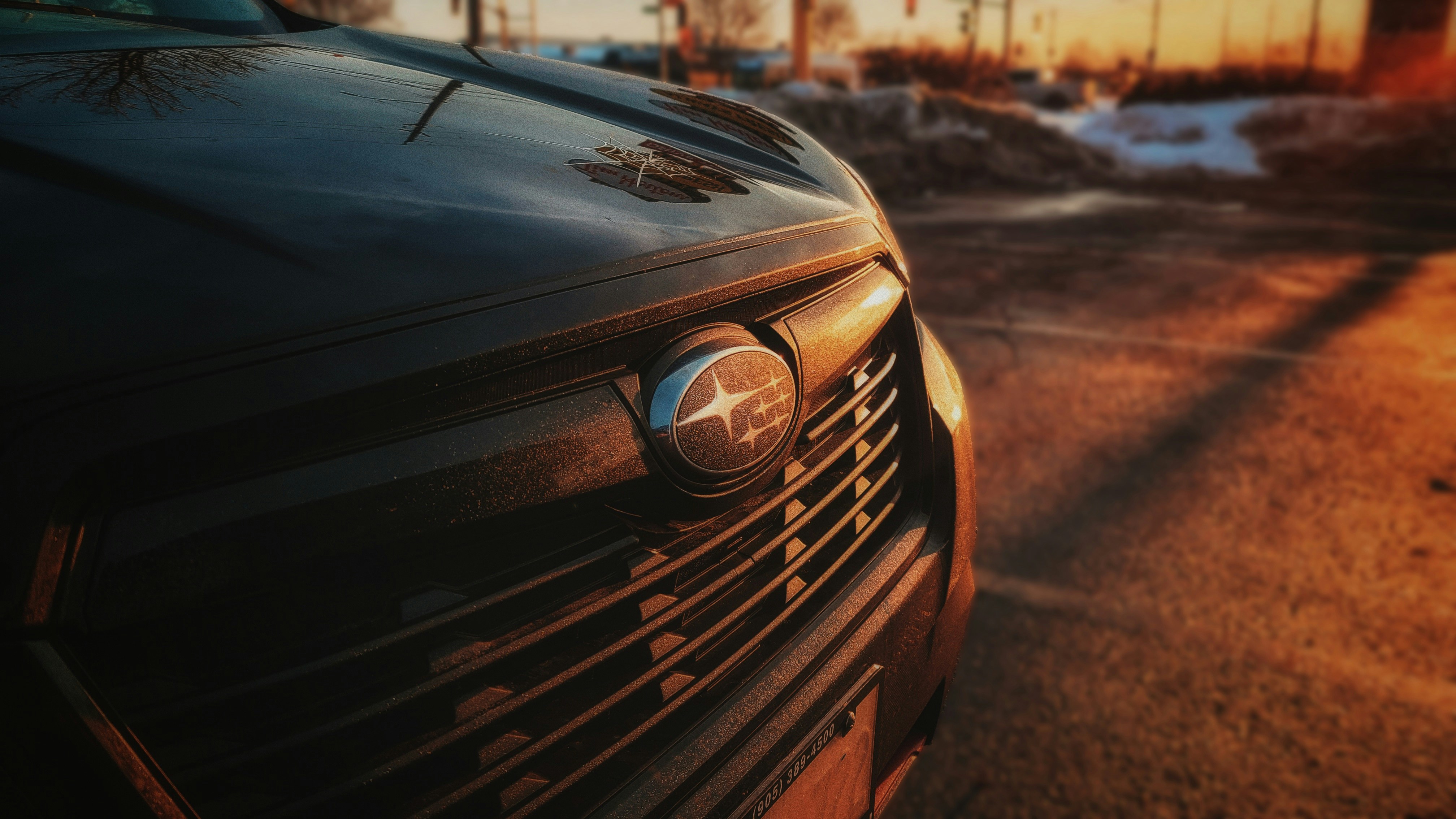 a close up of a car parked in a parking lot
