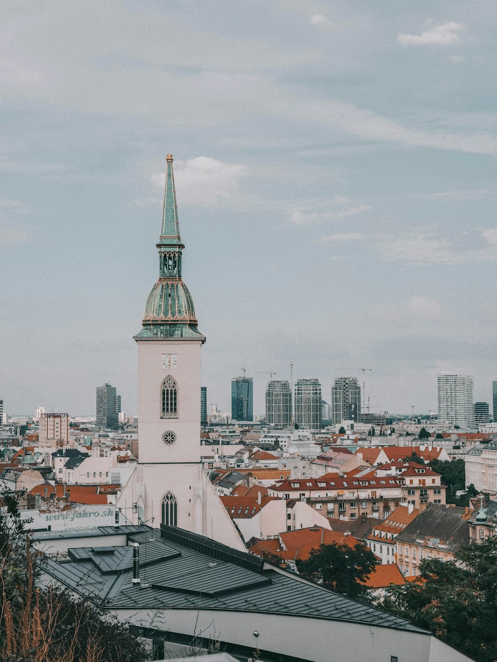 a view of a city with a clock tower