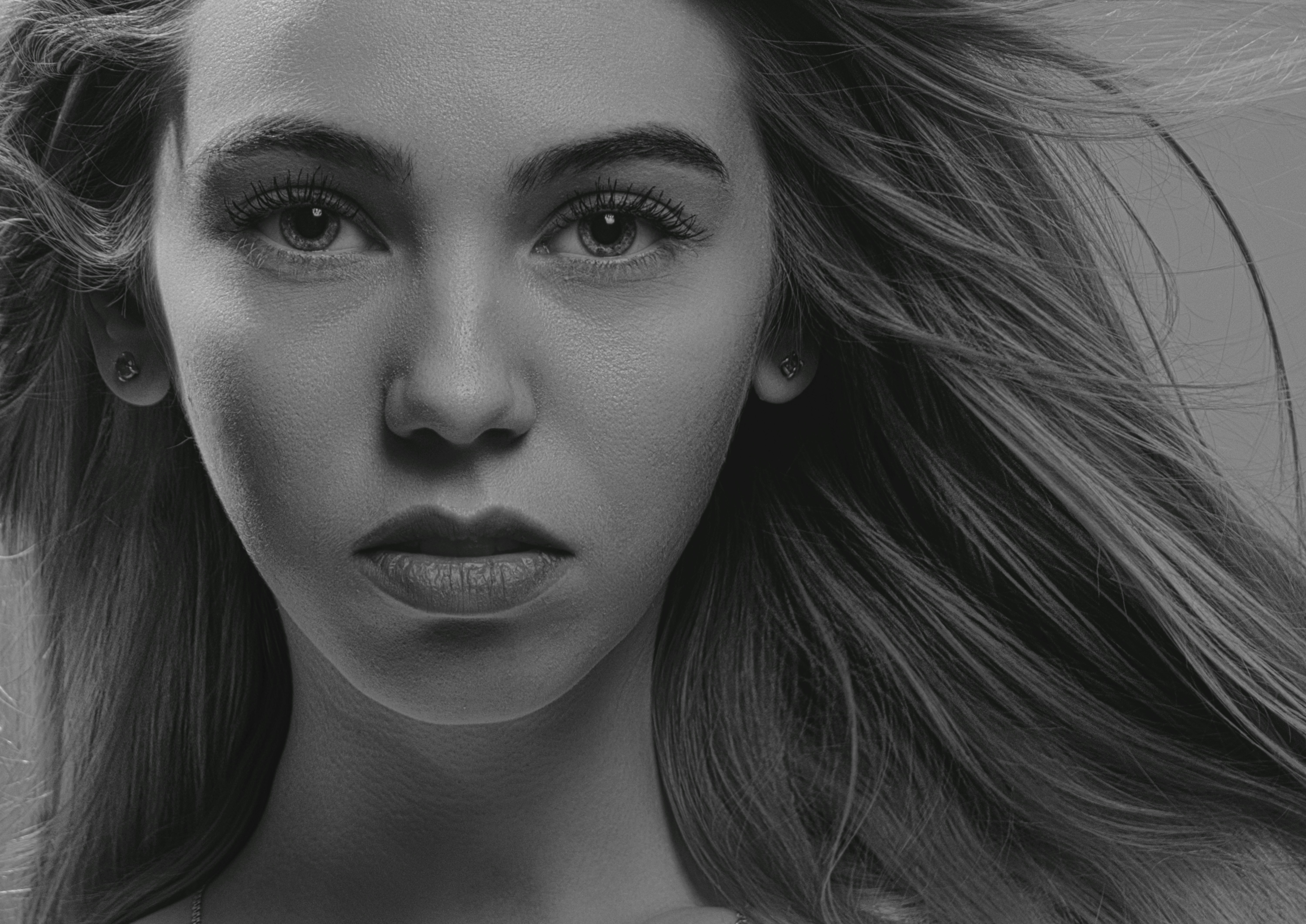 digital art AI image generation software - a black and white photo of a woman with long hair