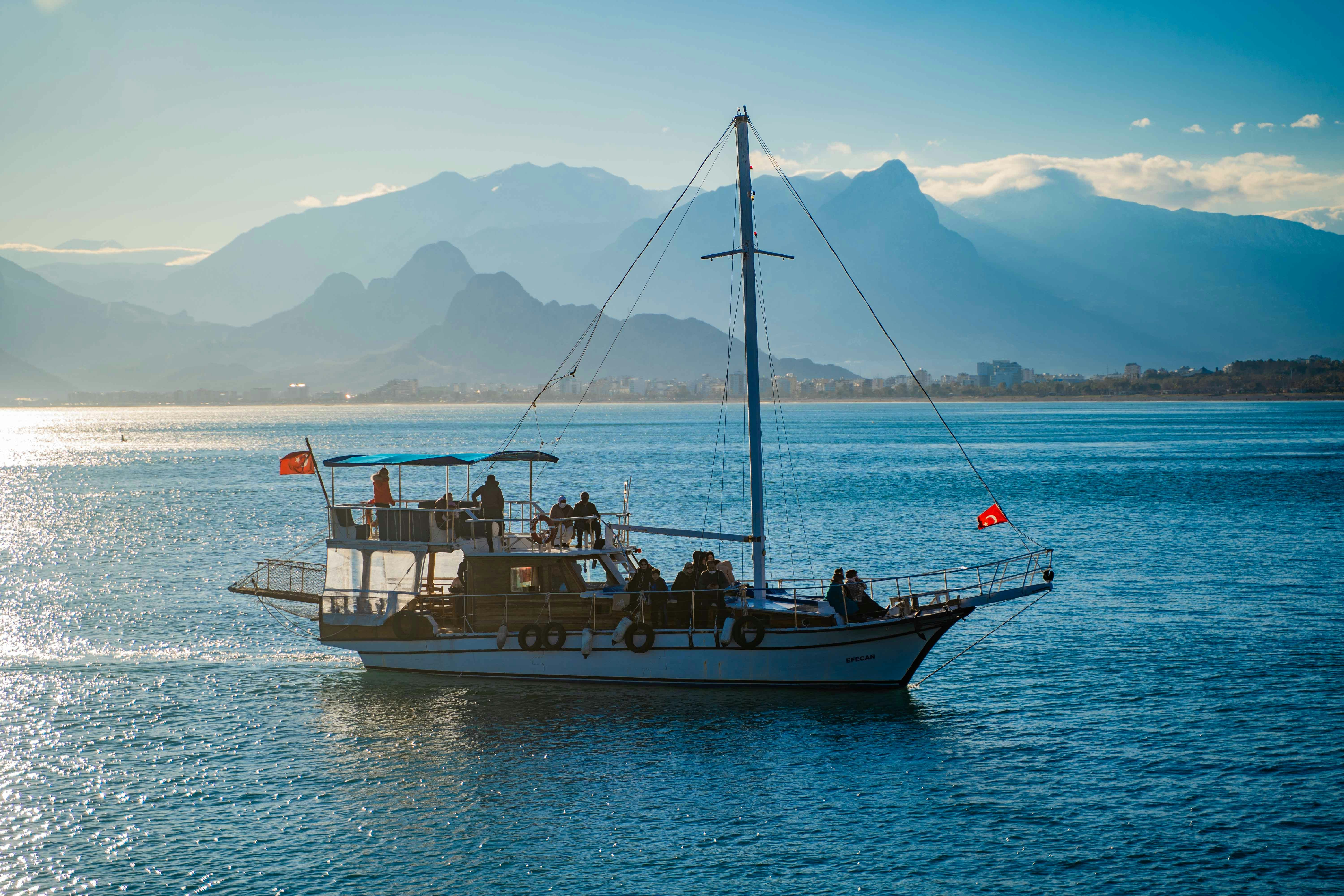 Private traditional gulet sailing the turquoise Mediterranean coast near Antalya