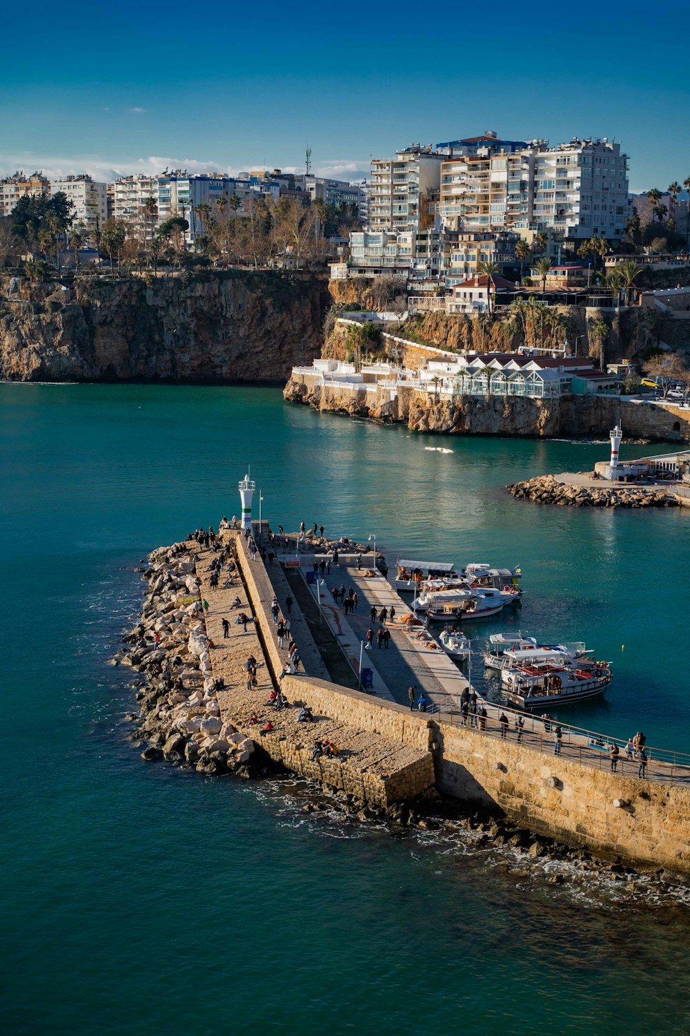 a large body of water next to a city