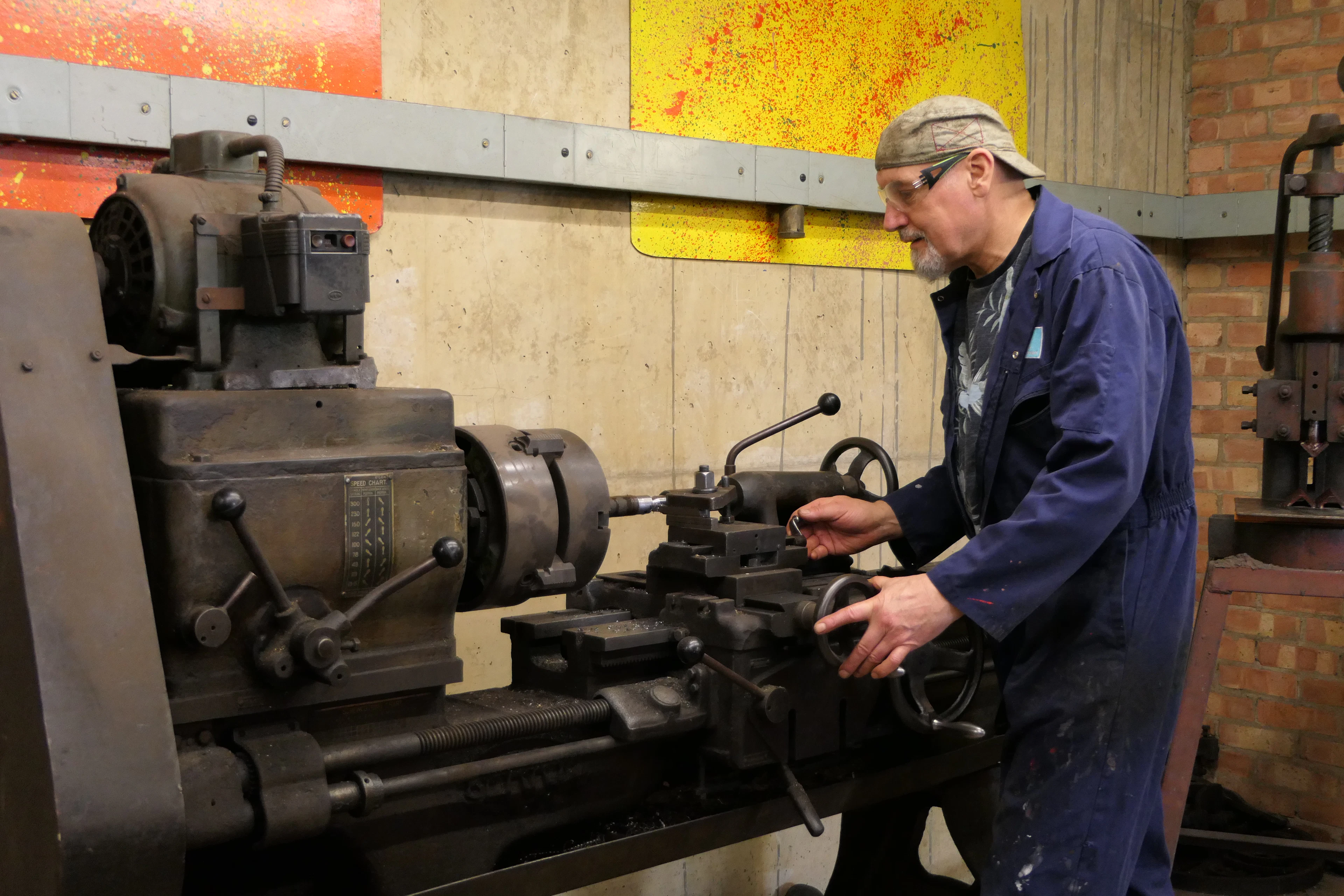 Machinist operating a lathe