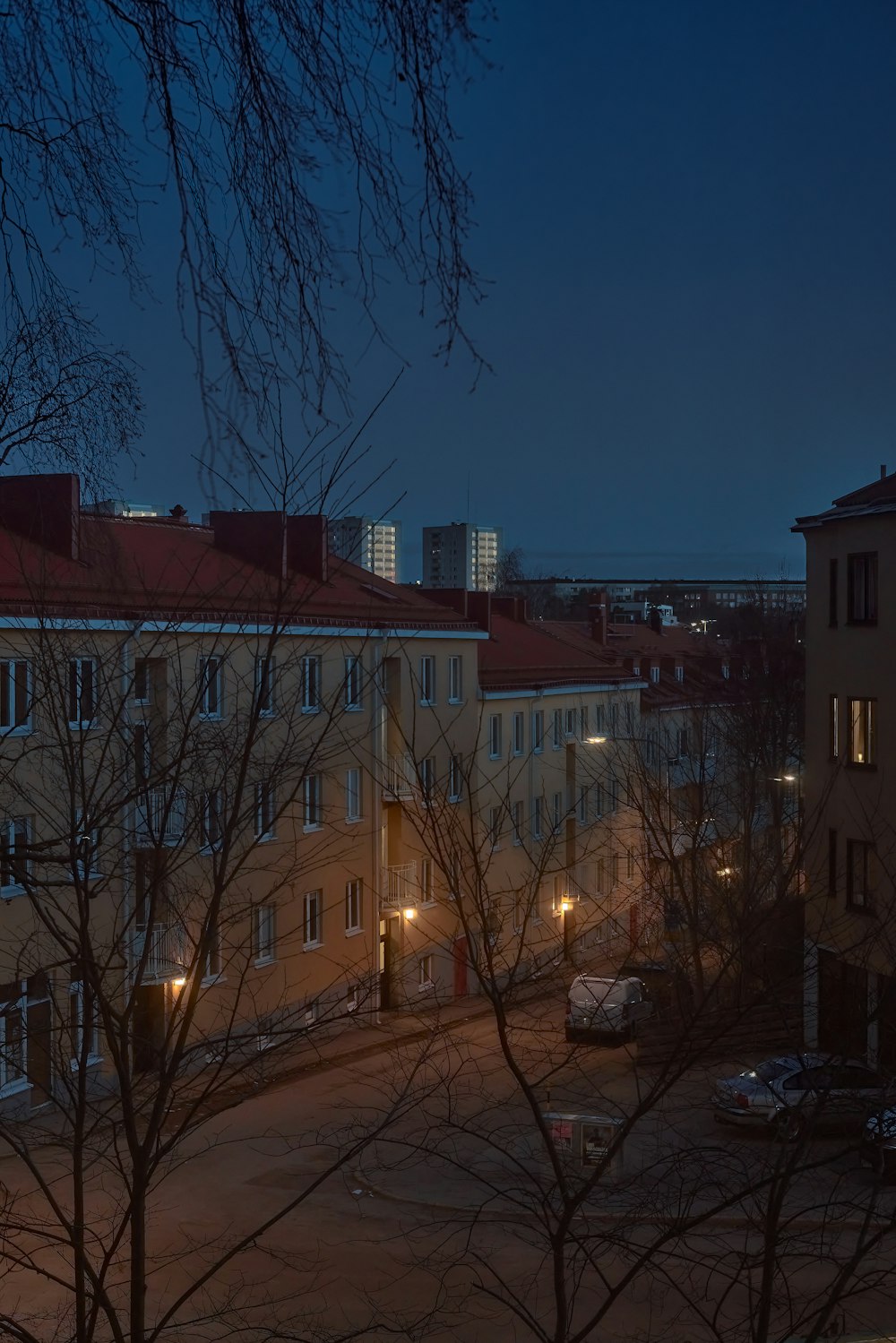 a view of a city at night from a distance