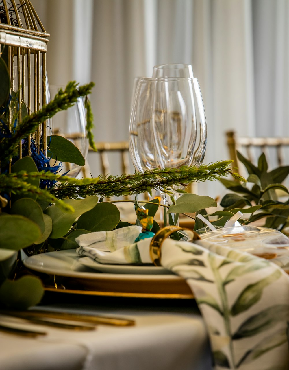 a close up of a table with a birdcage