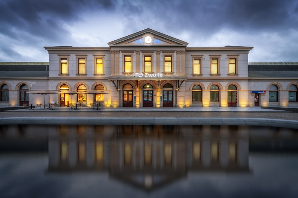 a large building with a clock on the top of it