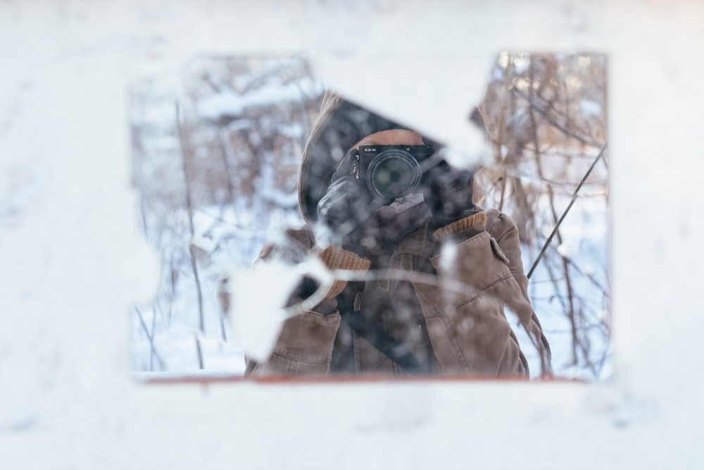 a reflection of a person in a mirror