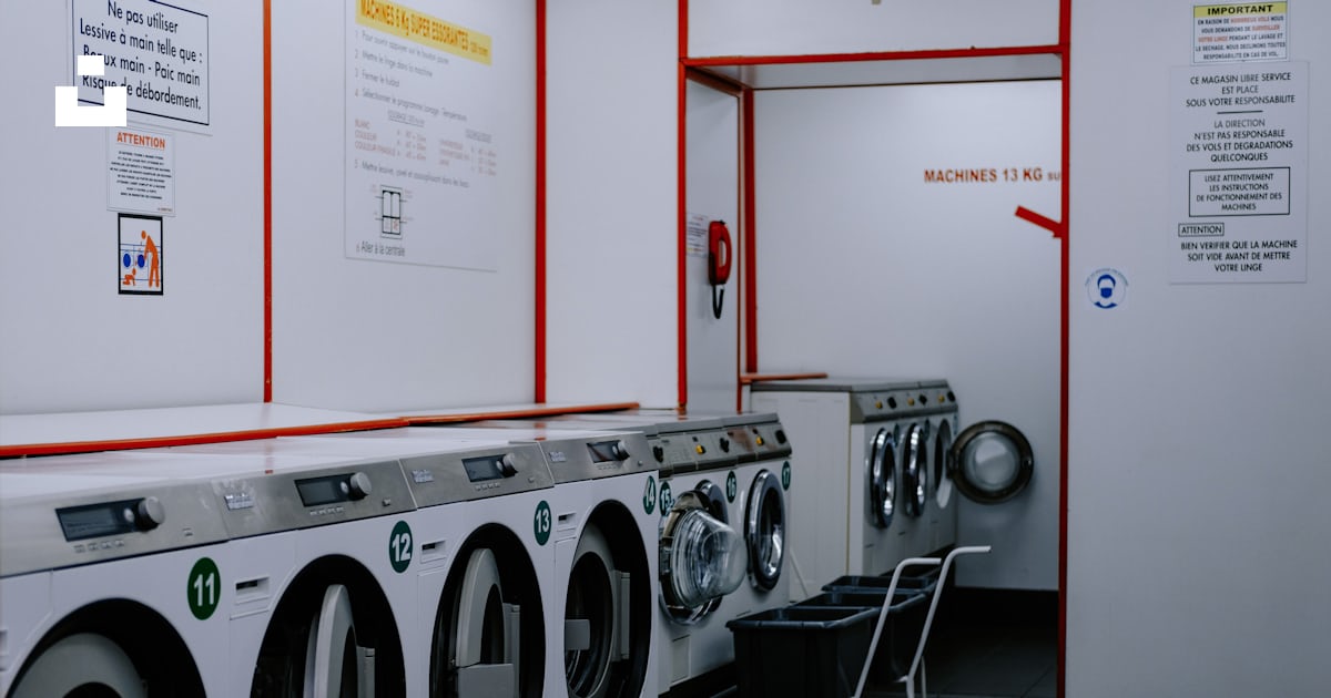 A row of washing machines in a laundry room photo – Free Paris Image on ...