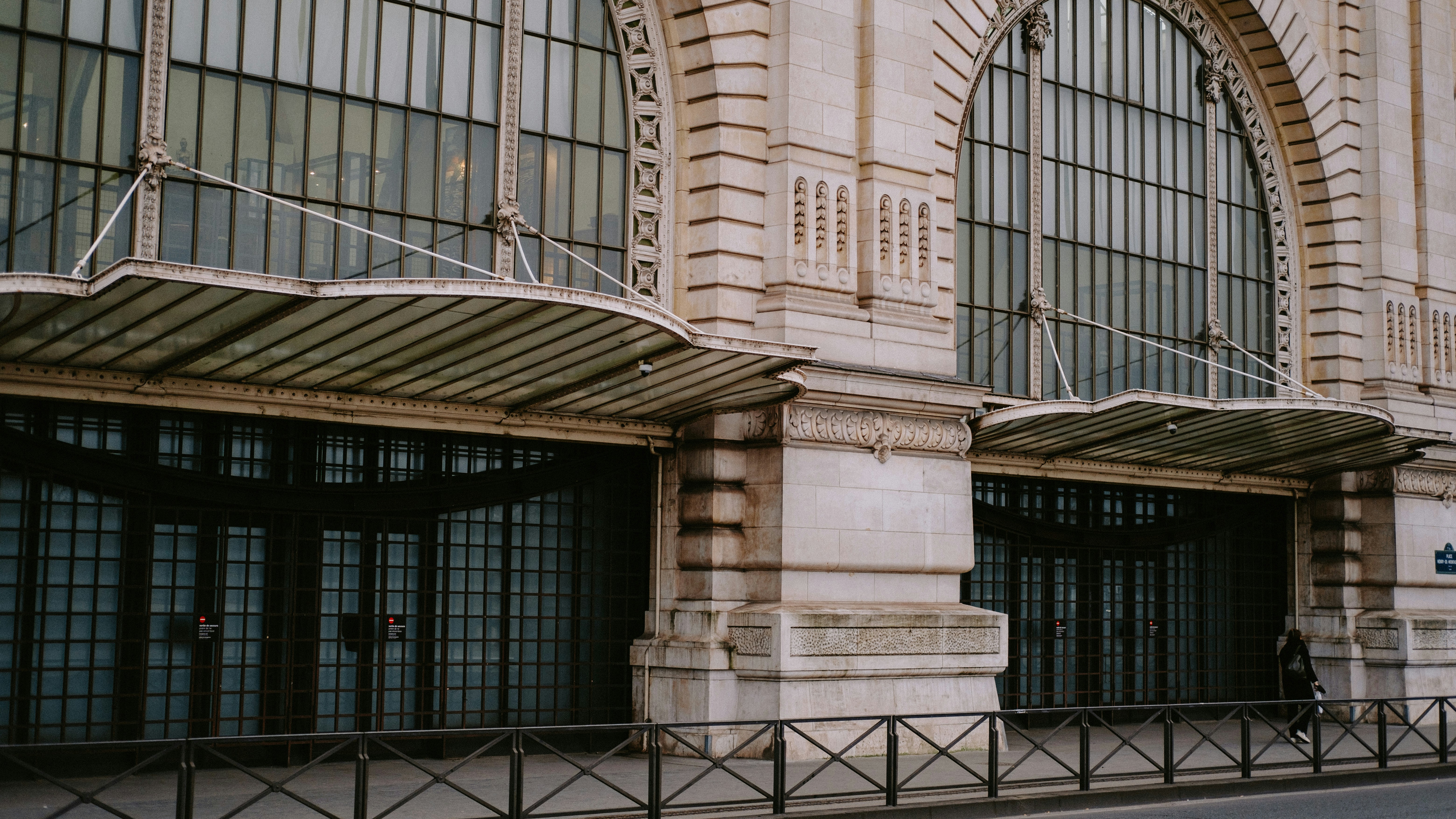 a tall building with a clock on the front of it