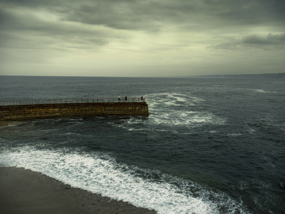 a pier on the edge of a body of water