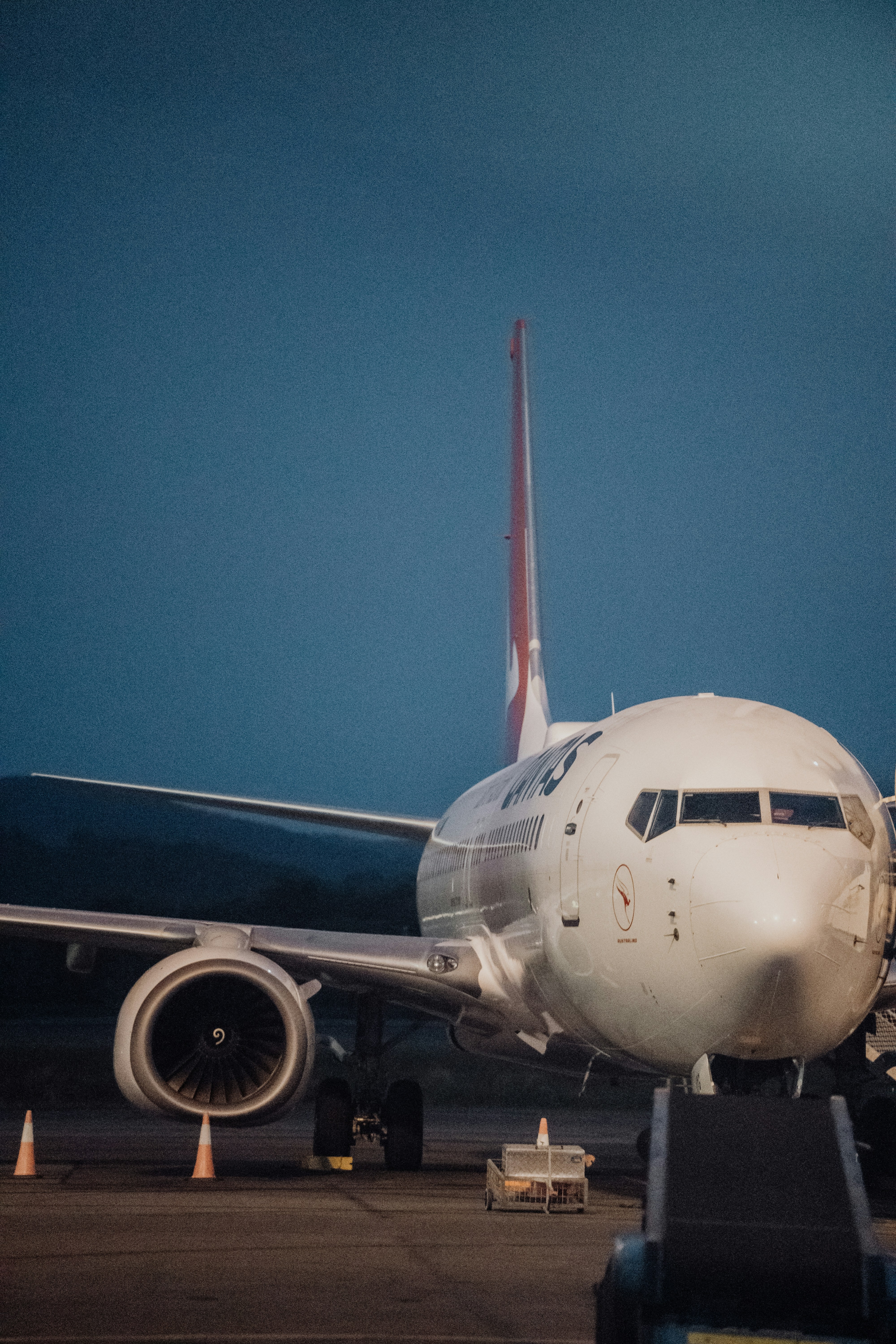 a large jetliner sitting on top of an airport tarmac